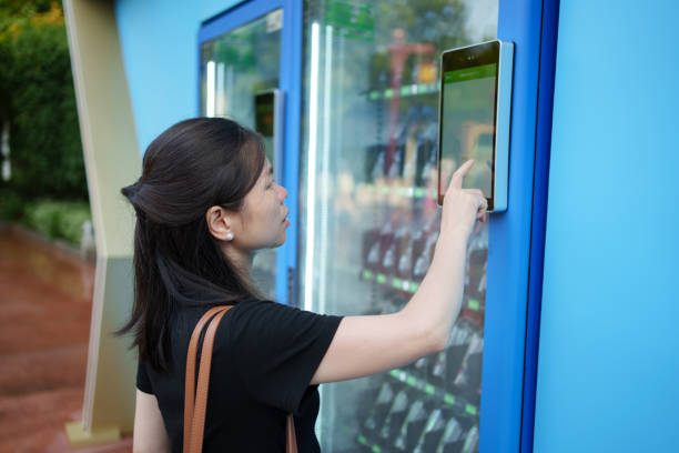 Woman-using-vending-machine_1765522856